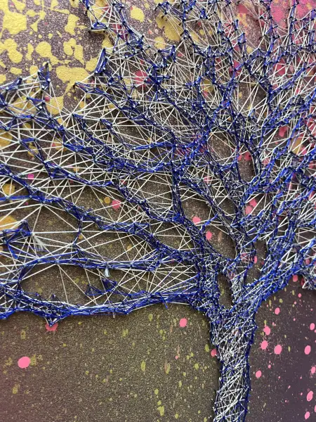 Click Here To Enlarge This Photo Of A Neon Web